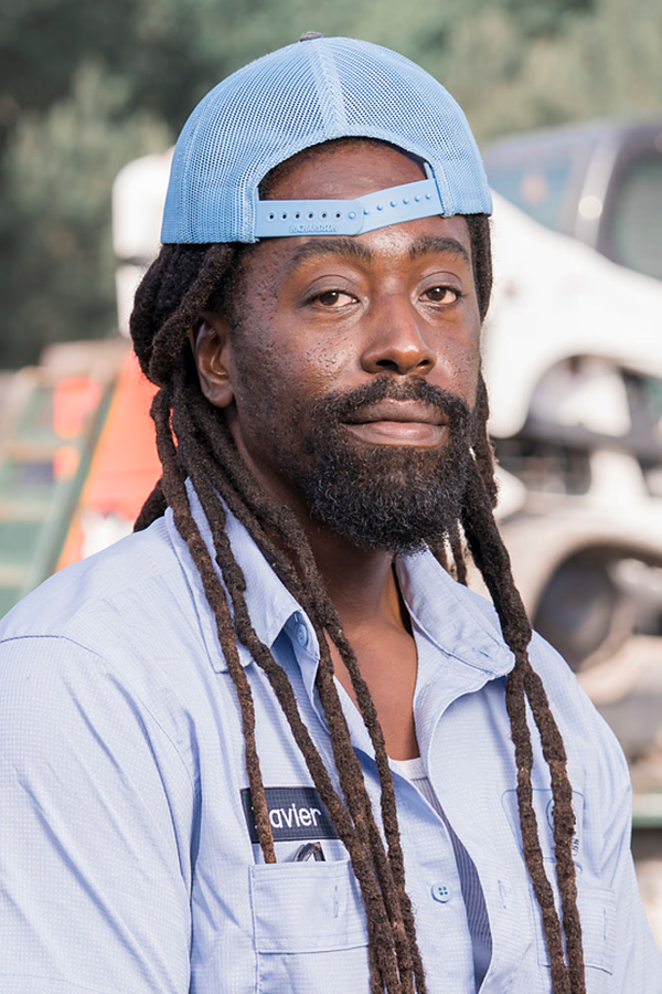 Zavier, landscape professional at East Coast Consolidated Landscaping, providing dependable grounds management and landscape installation services.