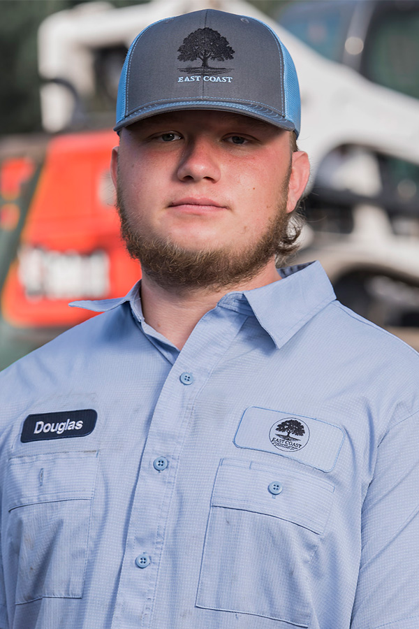 Douglas, landscape construction team member at East Coast Consolidated Landscaping, supporting outdoor improvement projects with quality workmanship.